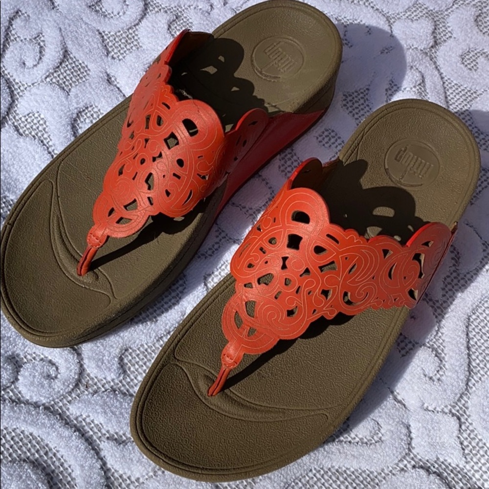 Coral and brown flip flops for healthy feet